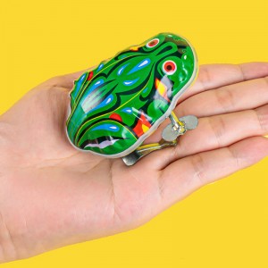 игрушка, жестяная лягушка, прыгунья в струны, заводная игрушка