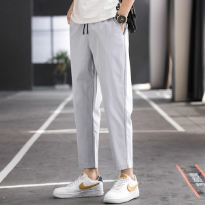 슬림한 여름 남성복 캐주얼 팬츠 한국판 트렌디한 남성 백코디 날씬해 보이게 슬림하고 스포티한 스트랩 9부 팬츠 