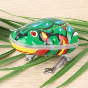 игрушка, жестяная лягушка, прыгунья в струны, заводная игрушка