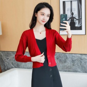 Small knitted cardigan with V-neck, long sleeve, short style, over sweater